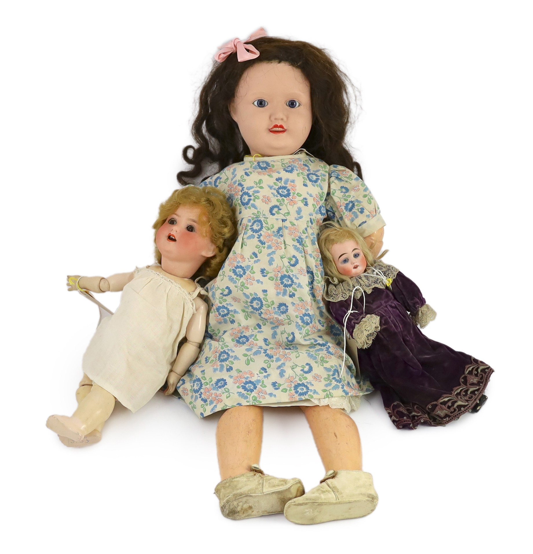 A Sonneberger Porzellanfabrik bisque doll, German, circa 1900, 14in. (3)